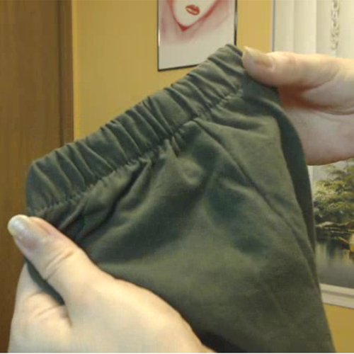 Elastic trim at the bottom of the pants