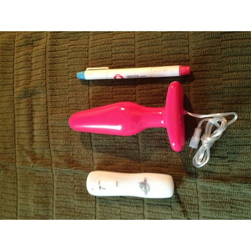 Glo thick vibrating butt plug pen compare