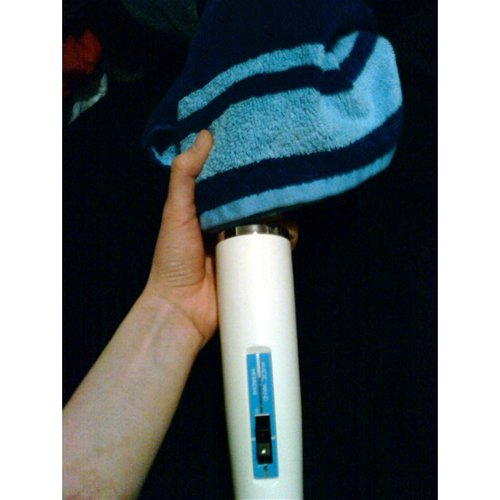 Towel around Hitachi