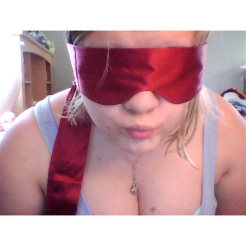 Adore me blindfold on