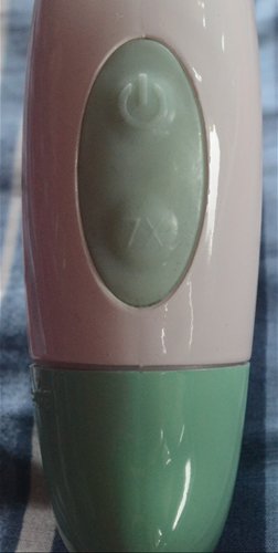 Button and battery compartment