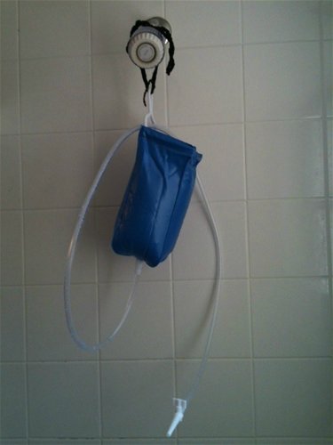 Enema Kit Hanging From Shower Head