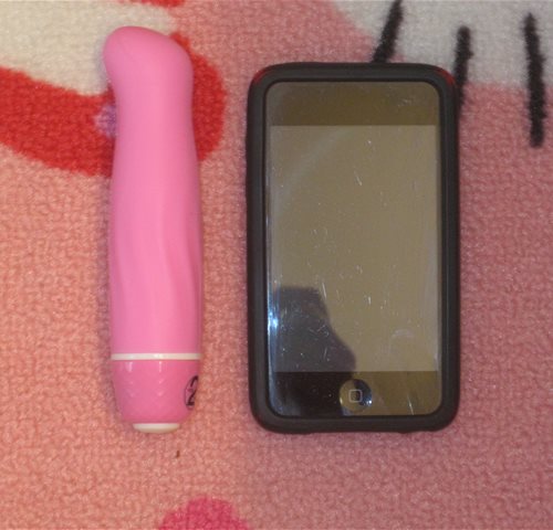 size comparison to iPod and a crazy haired shadow reflection