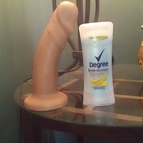 Maverick next to a 2.6 oz. deodorant