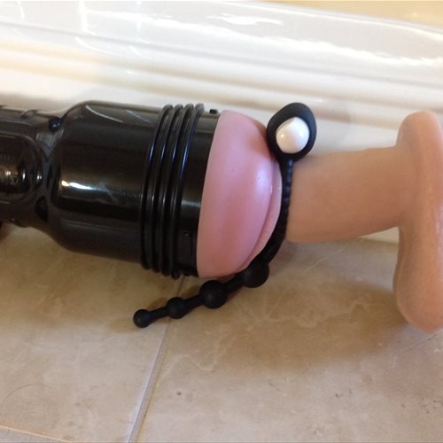 Cock/clit vibe in place and beads ready to go
