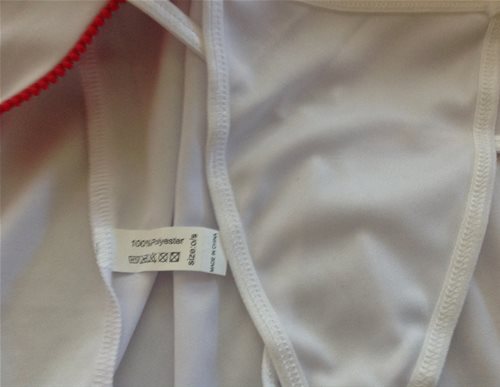 Shirt tag shows handling instructions /thongs: high quality workmanship