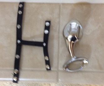 Turn sideways could look like letter H. Along side is the nJoy 2.0
