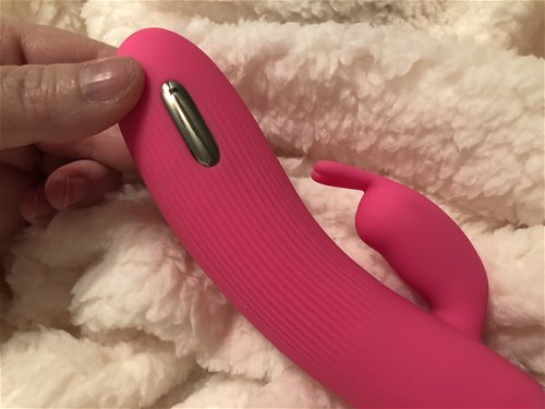 close up of electric plate and rabbit clit vibrator