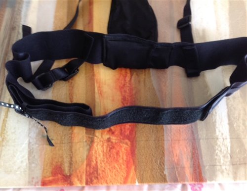 Adjustable to fit my size 6- Inside has 2 little pockets behind dildo holder for bullet vibes