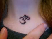 At the base of my throat, the center of my collarbone