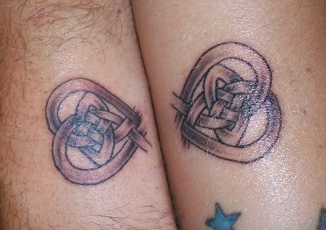 My partner and I have matching tattoos. Together, they form a celtic heart knot eternity sign.
