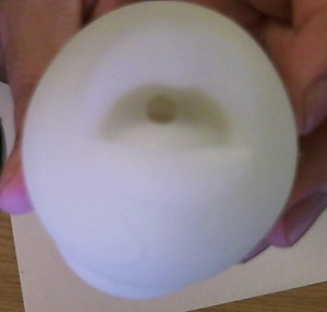 State the obvious: The Glow lips opening is designed to look like lips.